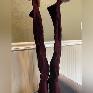 Red shoe dazzle over the knee tight boots. US size 9